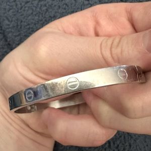 Stainless steel faux love bracelet, hinge closure, hardly worn & needs cleaning